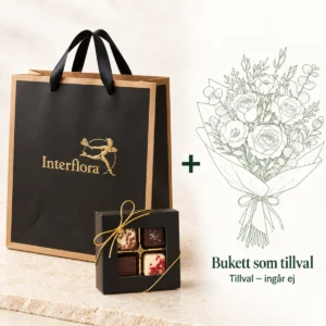 Presentkit Lyx: svart presentpåse från Interflora och chokladask med praliner, plus en tecknad bukett som tillval – buketten ingår inte.